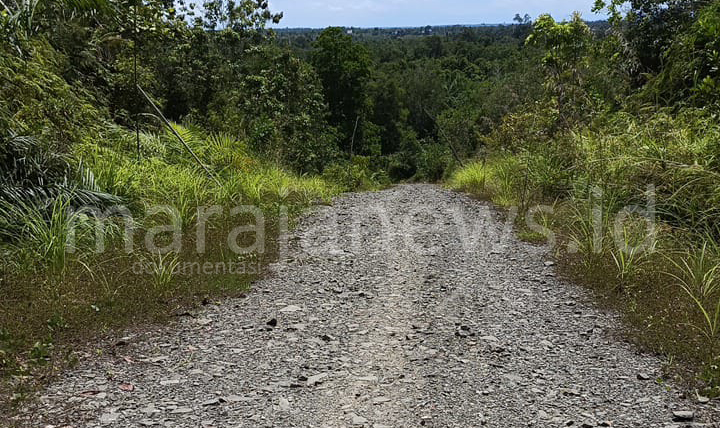 Jalan Kilo 2 Desa Binusan