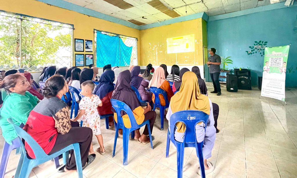 PT Pegadaian Gelar Literasi Keuangan tentang Produk Gadai di Desa Binusan